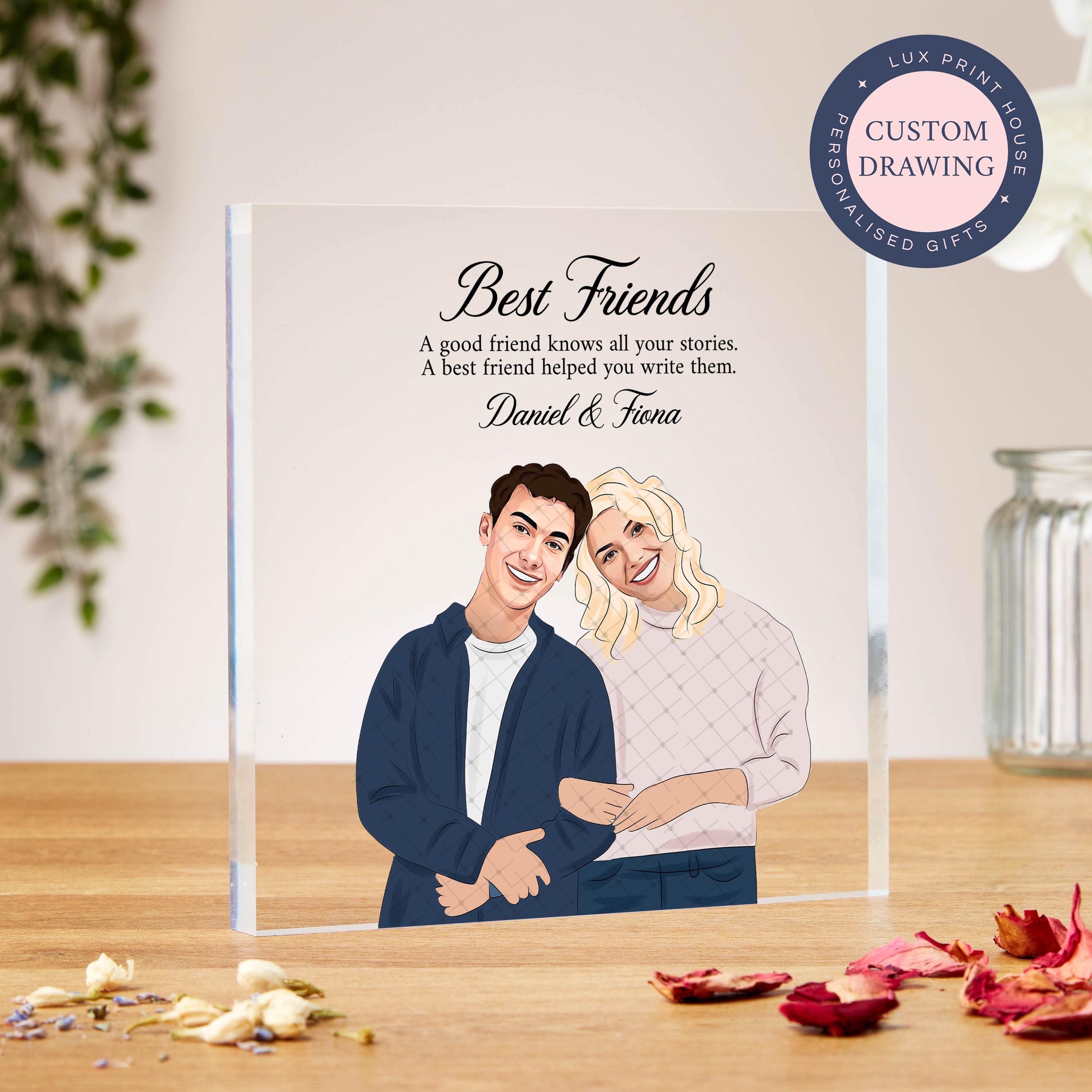 A personalised best friends acrylic plaque featuring a custom portrait drawing of two friends, designed in a cheerful, faceless art style. The pair is shown smiling with arms linked, under the heading “Best Friends” and a sweet friendship quote. Includes space for personalised names, making it a thoughtful custom gift to celebrate a special friendship with unique, illustrated artwork.